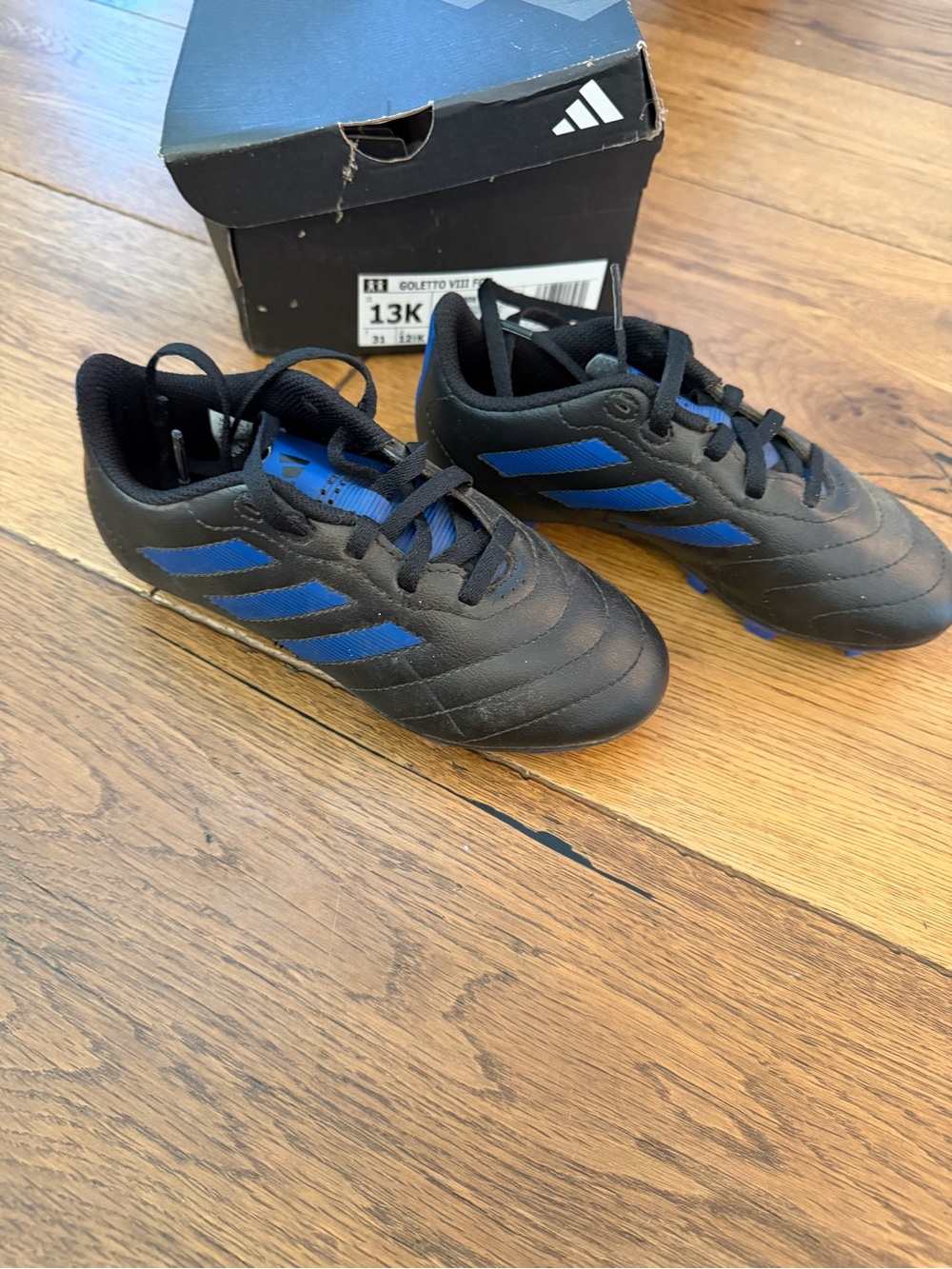 Adidas Kids Black and Blue Soccer Cleats size 13 kids (US). Worn once!!